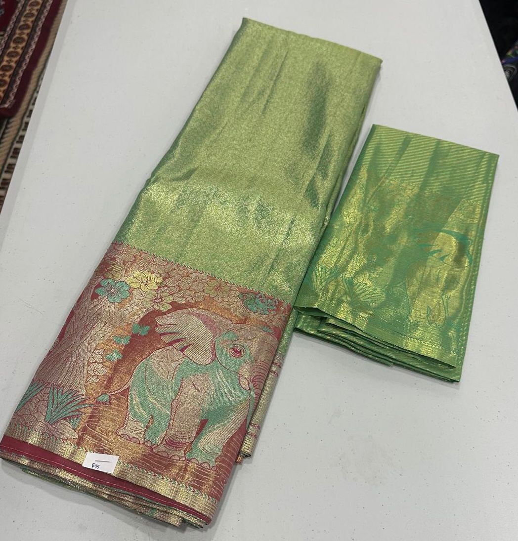 Peacock green tissue sarees