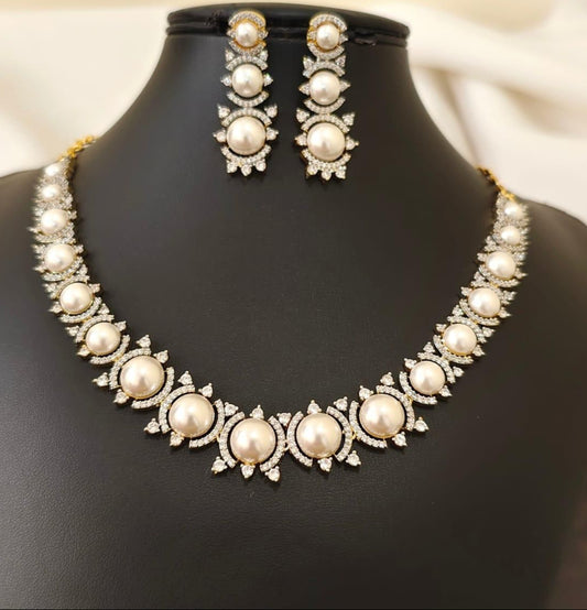 pearl set with ad stones